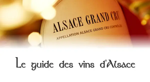 Etichetta di "Alsace Grand Cru" su una bottiglia, con testo "Le guide des vins d'Alsace" in basso.